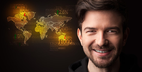 Portrait of a young businessman on dark background