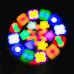 Abstract blur and bokeh of lights at temple in Thailand. Ferris