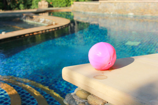 small Pink ball and Swimming Pool.