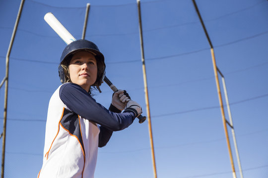Female batter ready to hit the ball during a baseball game