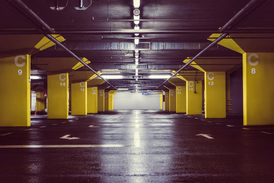 Underground parking garage at night