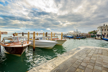 traditional venetian water taxi at St. Mark's Square, Venice, Italy, Europe