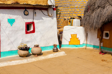 Entrance of traditionally painted house made with mud in a village of Khuri ,Jaisalmer,Rajasthan