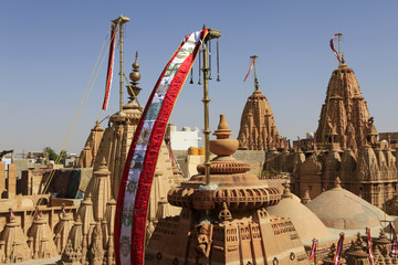 Flags and detail reliefs on rooftops of Jain temple in Jaisalmer,Rajasthan
