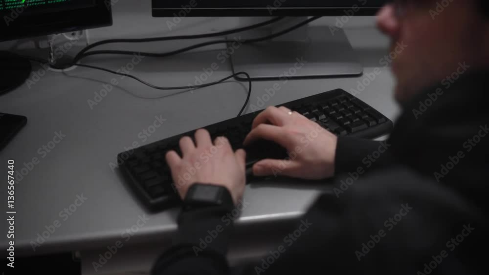 Poster beautiful man's hands with a black clock fast typing text, typing different characters on the keyboa