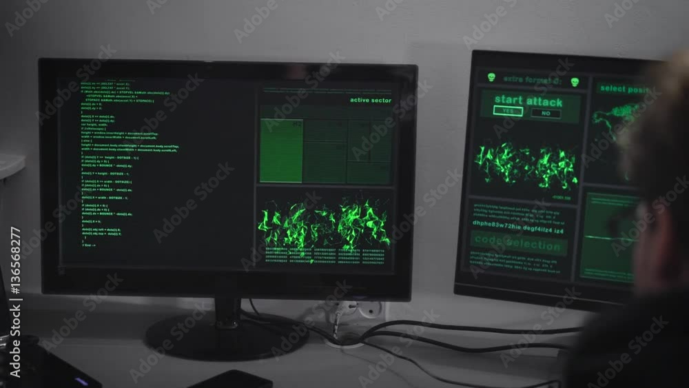 Poster hacker company. a hacker is preparing for a cyber-attack. a man at a rapid pace enters information. 