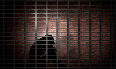 
    carcerato donna dietro alle sbarre 