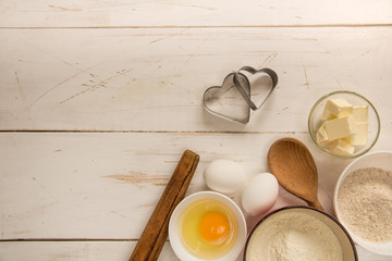 Baking ingredients for pastry on the wooden background