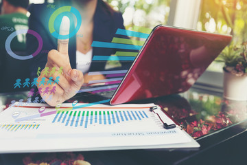 Business women looking at the marketing research.