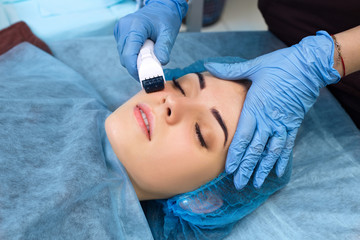 Mesotherapy face by mezoroller.