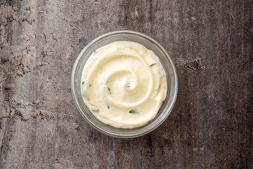Aioli sauce isolated on wooden background.Top view
