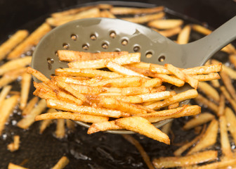cooking potato fries in oil