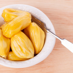 Tropical fruit Jackfruit (jakfruit, jack, jak) in bowl. Selective focus © jantima