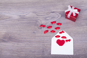 Envelope with hearts with a gift