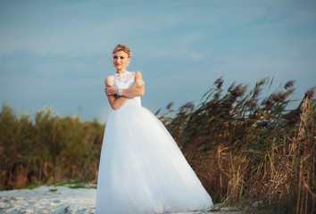 Colorful photo of the bride in the windy weather