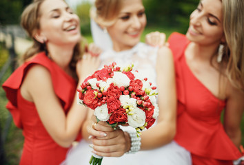 Beautiful bouquet and bride with the bridesmaids