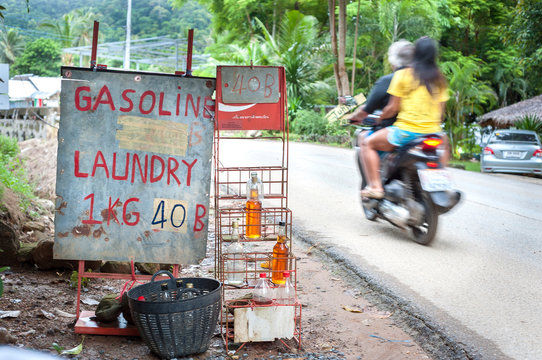 Gasoline for sale at a roadside stall on Koh Chang, Thailand