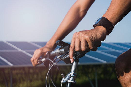 Close-up smart watch on arm man to ride a bicycle - Powered by Adobe