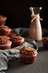 Muffins and cocoa drink glass bottle