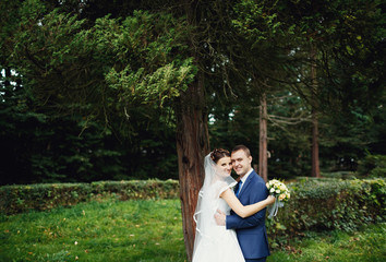 young   happy groom loves his wife