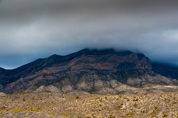 Desert landscape with clouds and fog in  Nevada, USA.