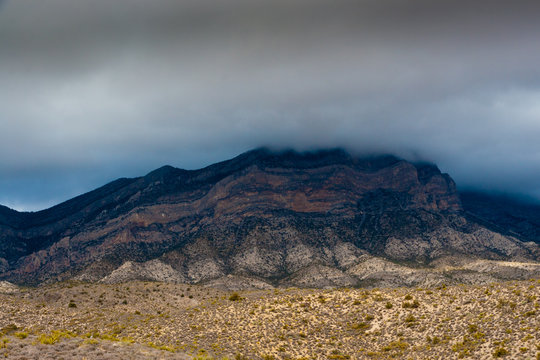Desert landscape with clouds and fog in  Nevada, USA.