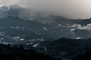 Misty summer mountain hills landscape