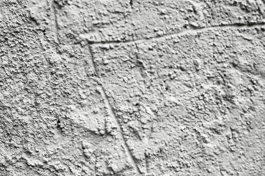 rustic off-white plastered wall