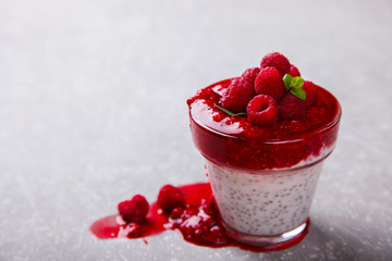 Yogurt with Fresh Raspberries and Chia seeds and mint.Concept Of A Healthy Breakfast.selective focus.