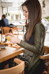 young woman in trendy tertaurant .fashion session 