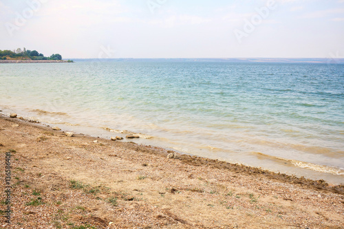 "Shore and beach of costesti big blue lake, north of republic of