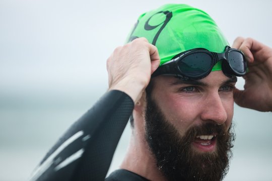 Athlete wearing swimming goggles