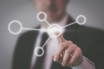 Businessman pointing  virtual user interface