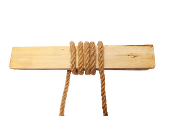 boards bound with a rope. isolated on white. horizontally.