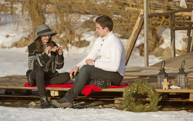 couple in love on the background of a winter landscape