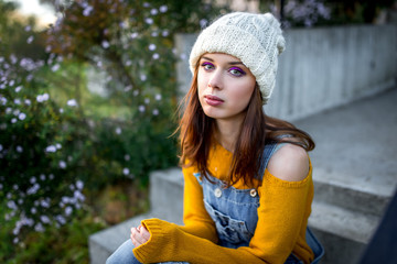photo session for a young girl in overalls