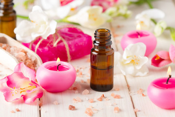 Obraz na płótnie Canvas Essential oil for aromatherapy, flowers, handmade soap,himalayan salt