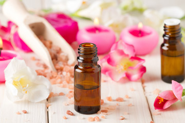 Obraz na płótnie Canvas Essential oil for aromatherapy, flowers, handmade soap,himalayan salt
