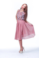 Young Woman In Pink Romantic Dress