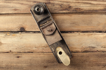 Tools. Planer on wooden background. Ready for work.