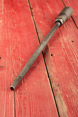 Tools. Rasp on wooden background. Ready to work.