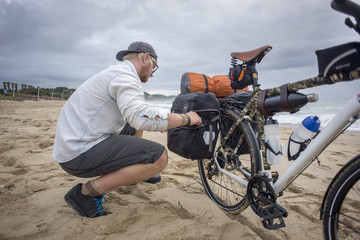 Cyclist Preparing Bicycle