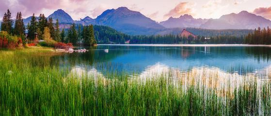 Majestic mountain lake in National Park High Tatra. Strbske ples - obrazy, fototapety, plakaty