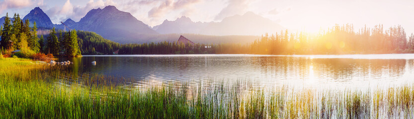 Majestic mountain lake in National Park High Tatra. Strbske ples - obrazy, fototapety, plakaty