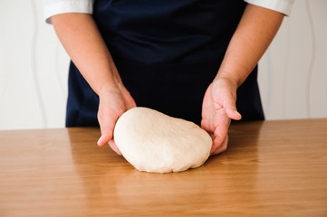 Chef preparing dough - cooking process