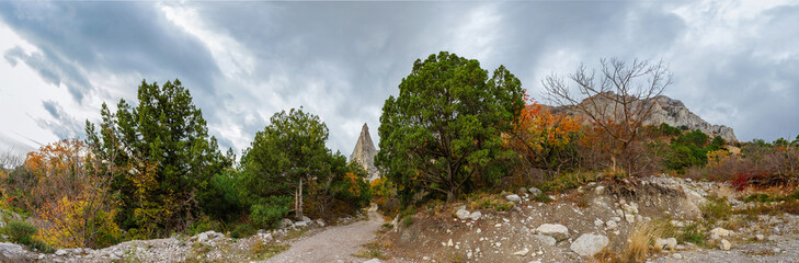 mountain cliff on a cloudy autumn day