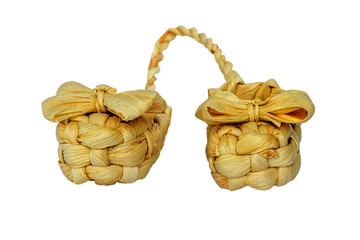 A pair of sand-colored straw shoes