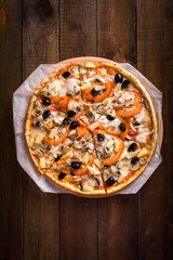 pizza on a wooden background