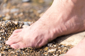 foot man on the stone ground