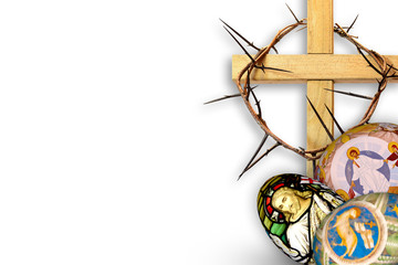Easter resurrection background with a cross, crown of thorns and painted Easter eggs